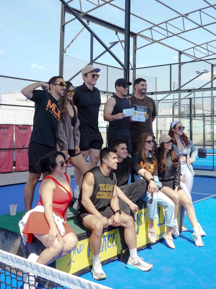MOB Fitness community celebrating with a six-week challenge winner